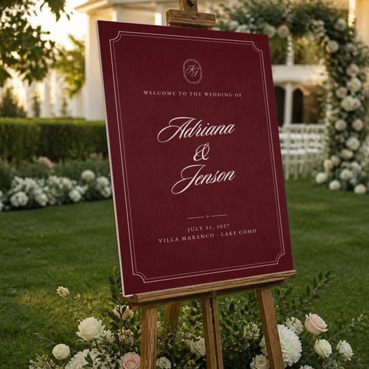 Old Money Classic burgundy wedding welcome sign on a wooden easel in a garden